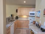 Kitchen - Remodeled with new cupboards and granite counters 
